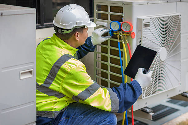 Professional Hvac technician working in East Moriches, NY